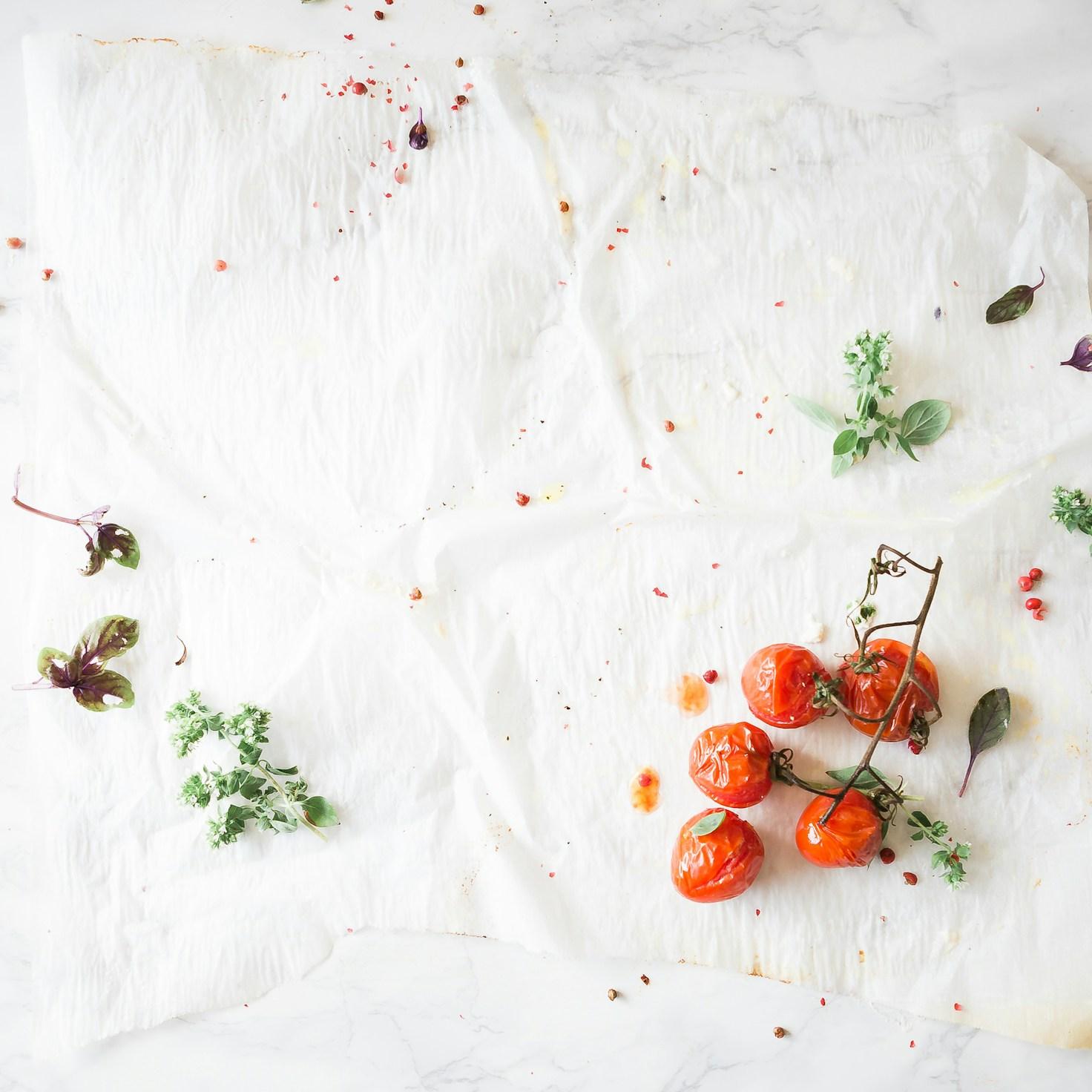 Neighbors working together in a contemporary kitchen, exchanging recipes and skills